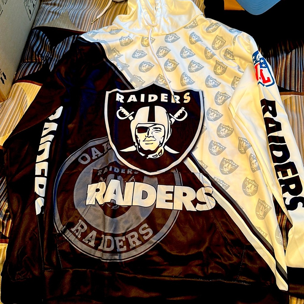 Oakland raiders hoodie. Silk like material. Says Large but i would say medium